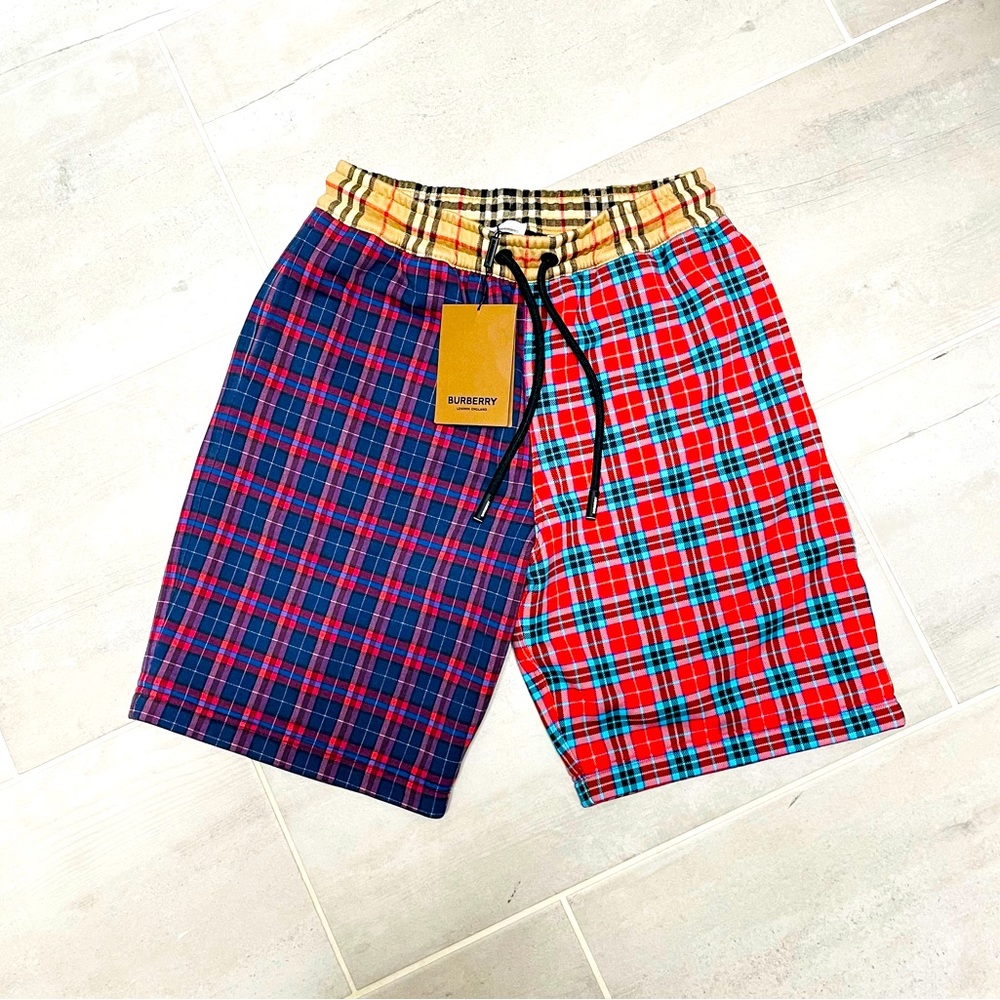 New Burberry authentic cotton shorts in man’s size S.